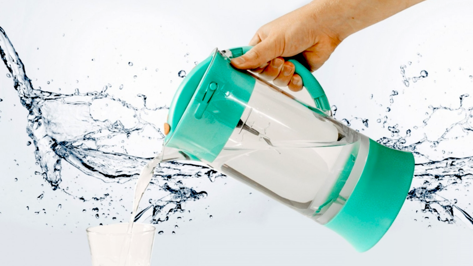 side view of living water vortexer pouring structured water into a glash with splash background