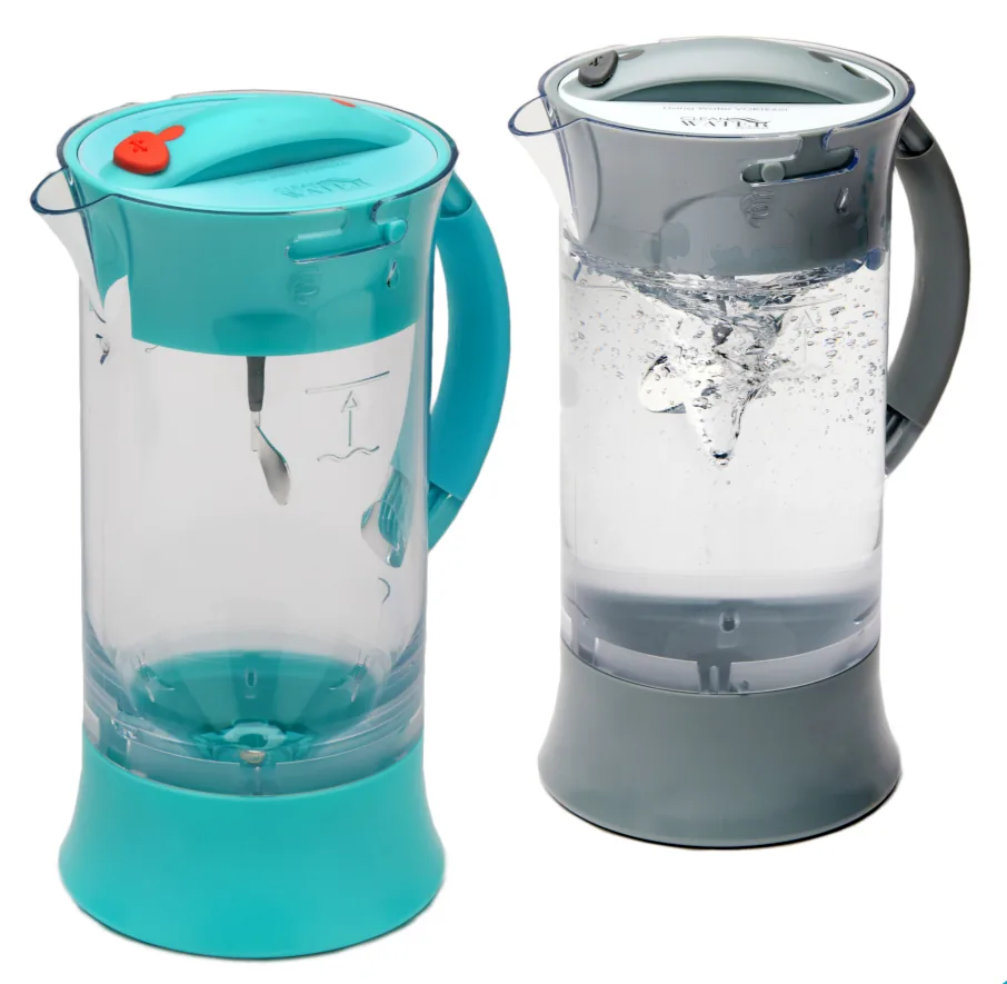 Aqua and Grey VORTEXèr water vortex pitchers side by side against a white background — the Aqua pitcher on the left shown empty, the Grey pitcher on the right filled with water and a central splash.